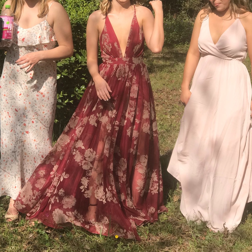 Long maroon/dark red formal dress with tan flowers